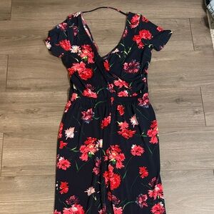 Express Black Jumpsuit with Red Floral Pattern